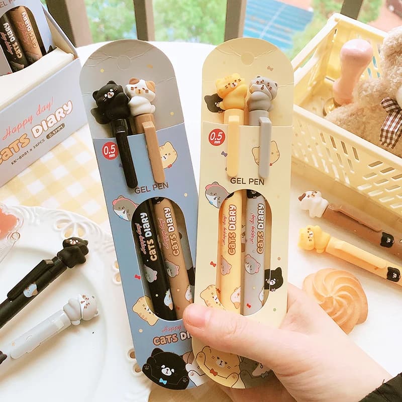 2 pz/scatola accessori per ufficio di cancelleria Kawaii kit di materiale scolastico regalo gatto penne carine estetica penna gel inchiostro nero penna a sfera