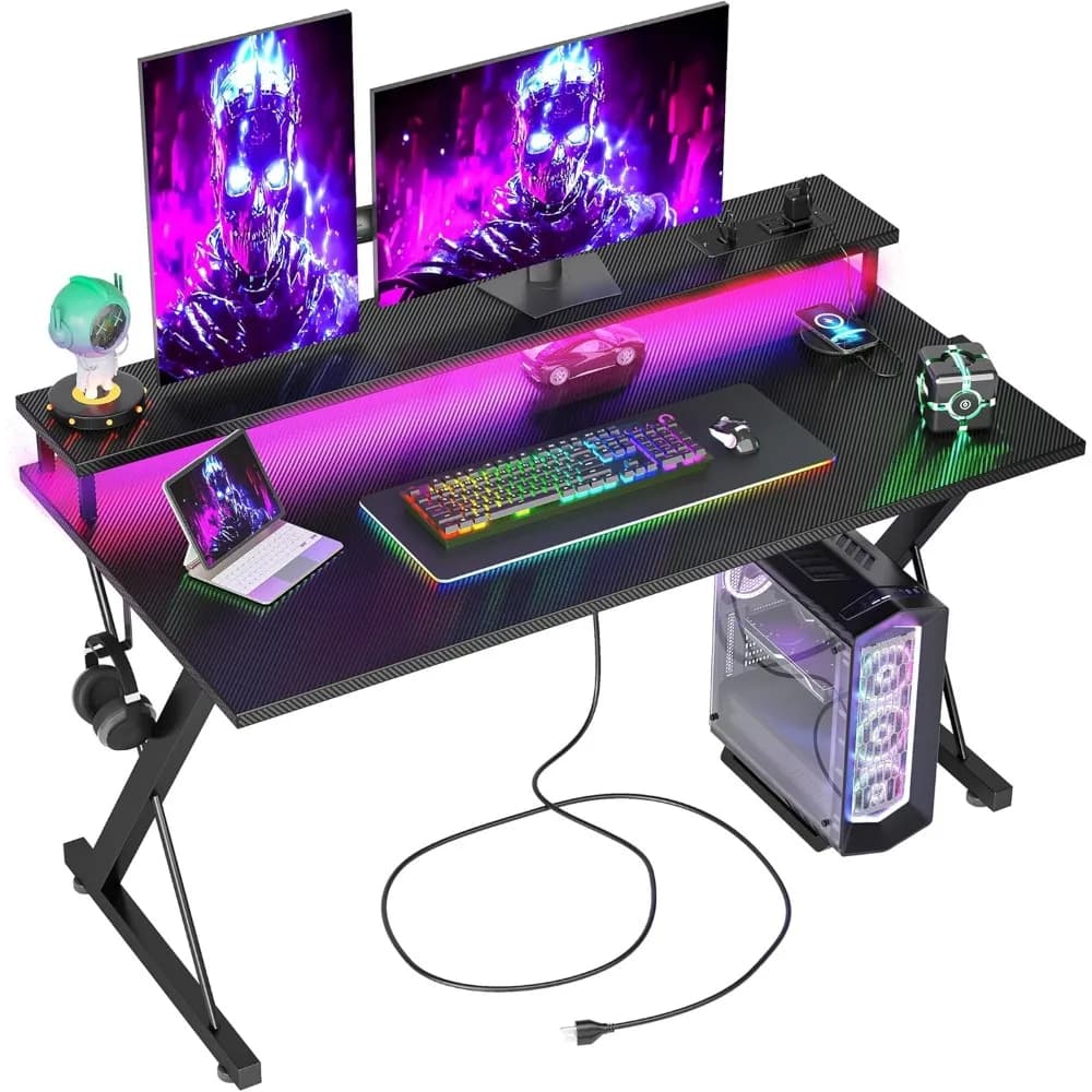 40 inch gaming desk with LED lights, sockets, ergonomic carbon fiber surface, wide monitor support and headphone hook
