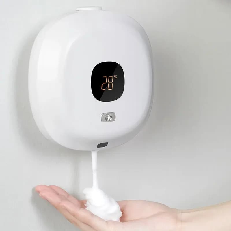 Lavatrice automatica a induzione per telefono cellulare in schiuma Distributore di sapone per disinfezione dell'hotel Macchina per schiuma montata a parete per uso domestico