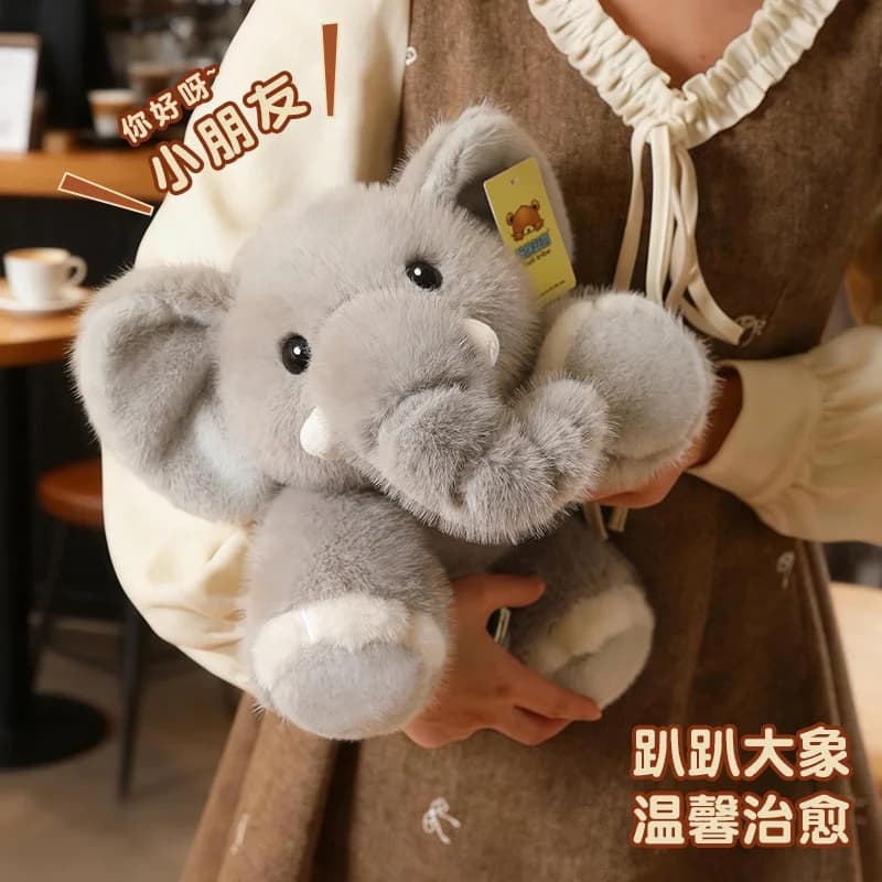 Peluche Elefantino Sdraiato, Morbido e Accogliente, Cartone Animato, Bambola Animale Calmante, Cuscino Decorativo per la Casa, Simpatico Regalo di Compleanno