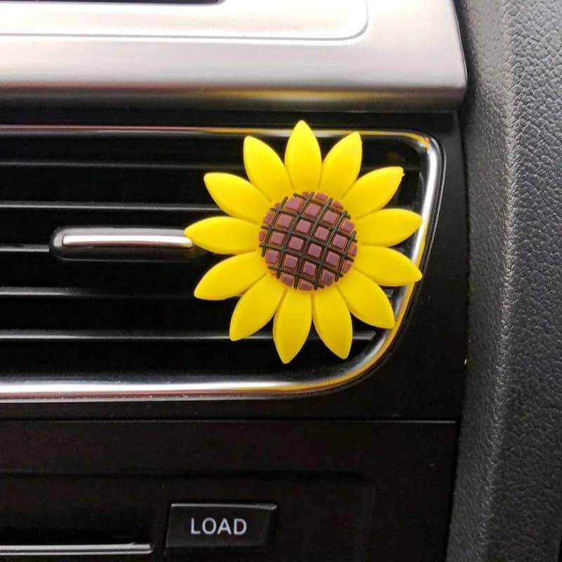 1 pezzo di grazioso diffusore di fragranze per auto con design a girasole, clip per presa d'aria, accessorio decorativo per interni, ideale per donne.