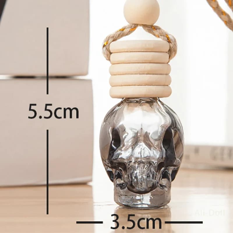 Perfume bottle for cars with gradual skull: diffuser of essential oils and deodorant for environments