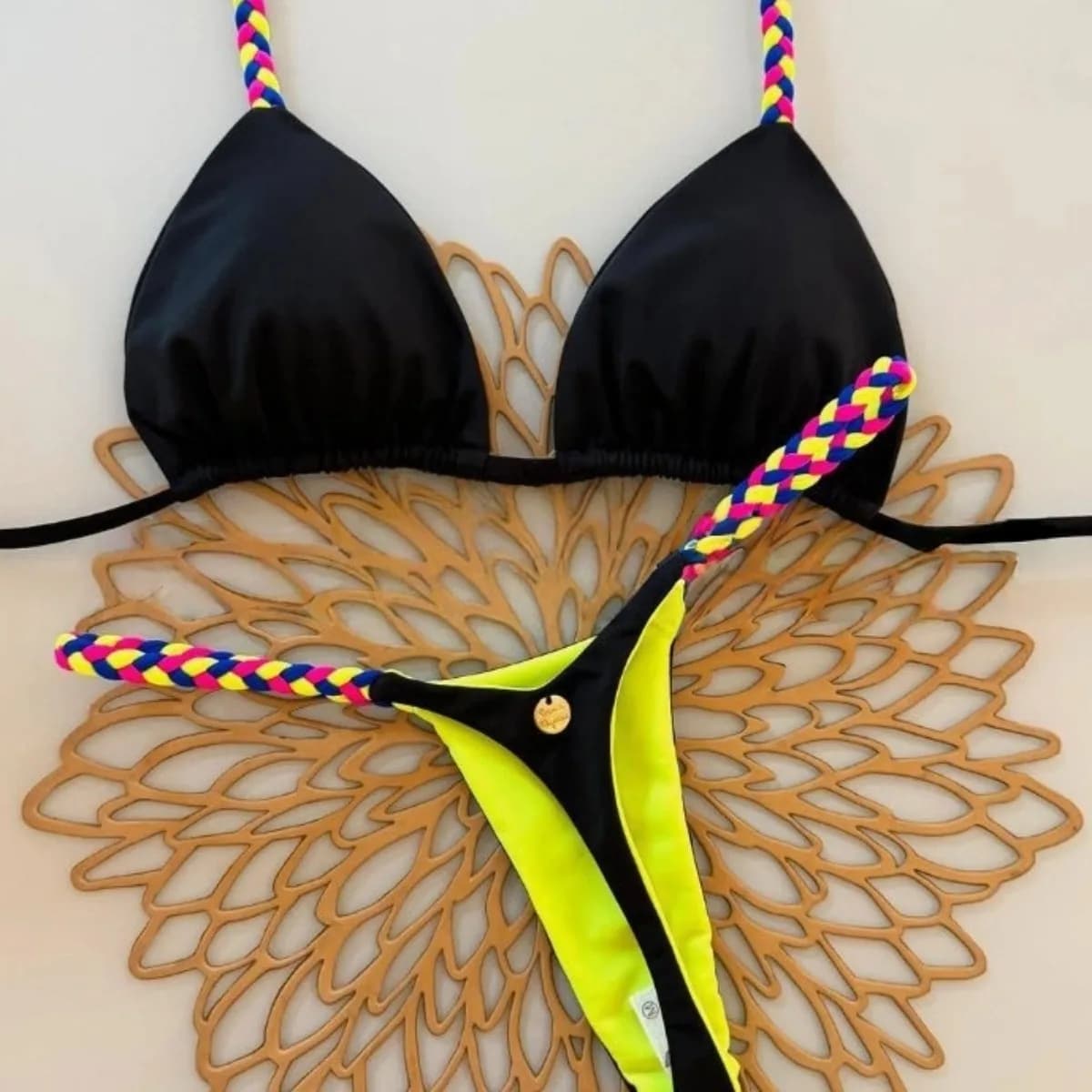 Sexy woman's swimsuits with bikini divided by sea holidays