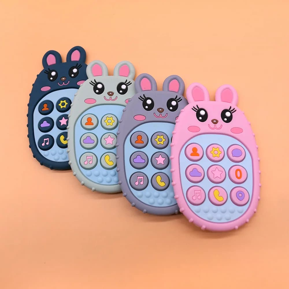 Massaggiagengive in silicone Massaggiagengive a forma di coniglio realizzato in materiale siliconico per alleviare la dentizione, adatto come regalo di festa per bambini