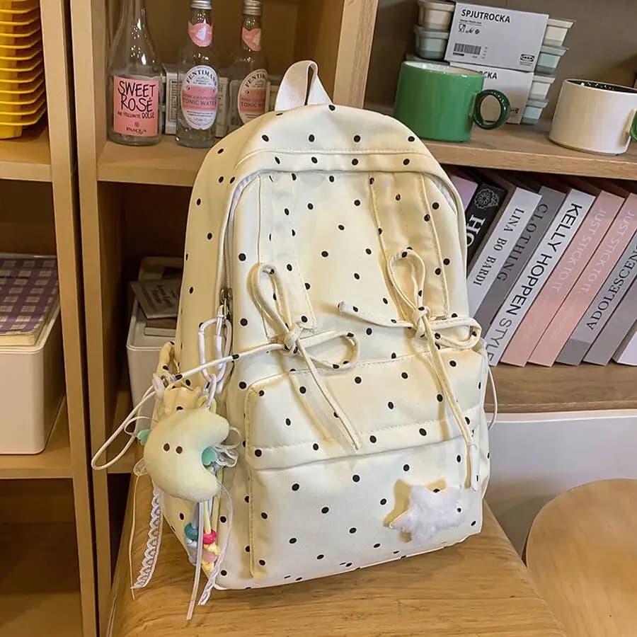 Simpatico zaino piccolo a pois per donna, elegante zaino da viaggio con decorazione a fiocco