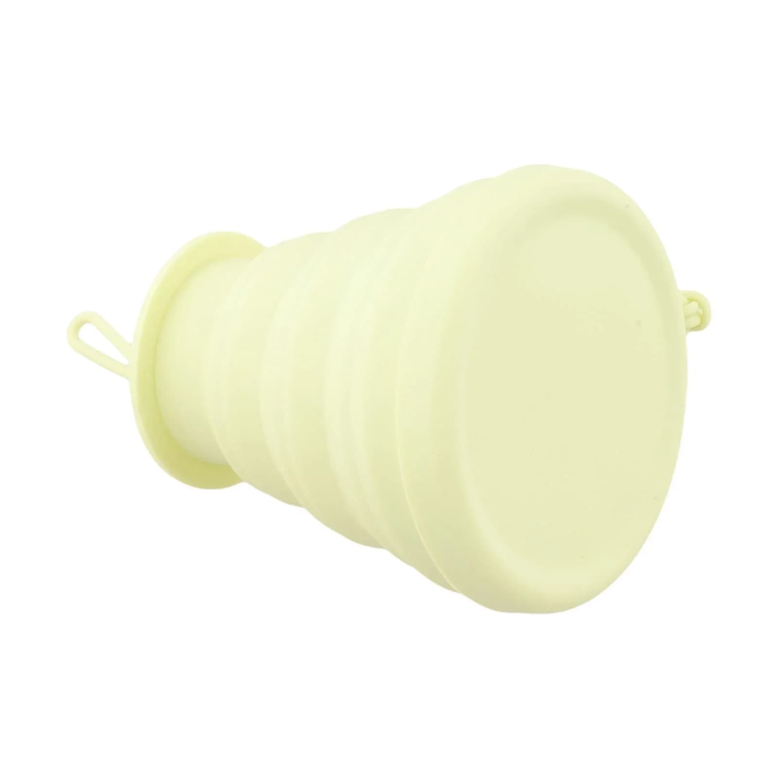 Foldable apricot-coloured camping cup for beach trips, folding picnic cup, compact size to store and use every day