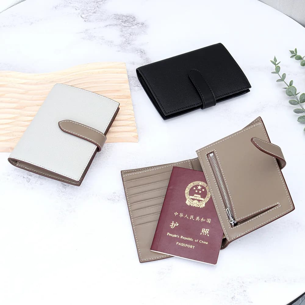 Porta Passaporto in Pelle Martellata per Donne, Portafoglio Bifold di Lusso con Chiusura a Scatto, Scomparti Multipli per Carte, Ideale per Affari