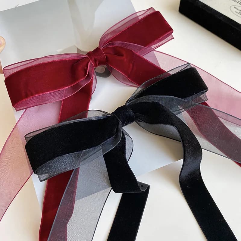 A vintage and high-end French fork with a mesh velvet bow