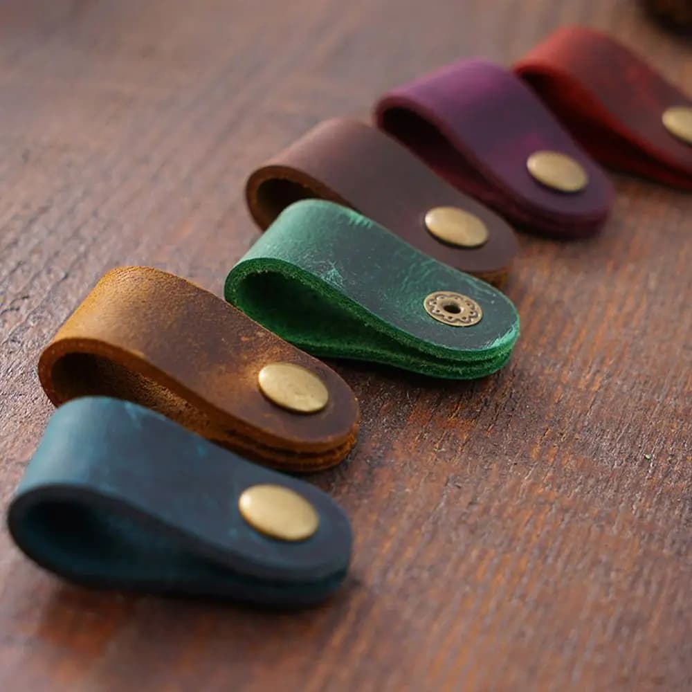 Organizzatore di cavi in pelle Clip di protezione per cavi per caricabatterie Avvolgicavo Accessori per auricolari Supporto per cavi Gestione dei cavi