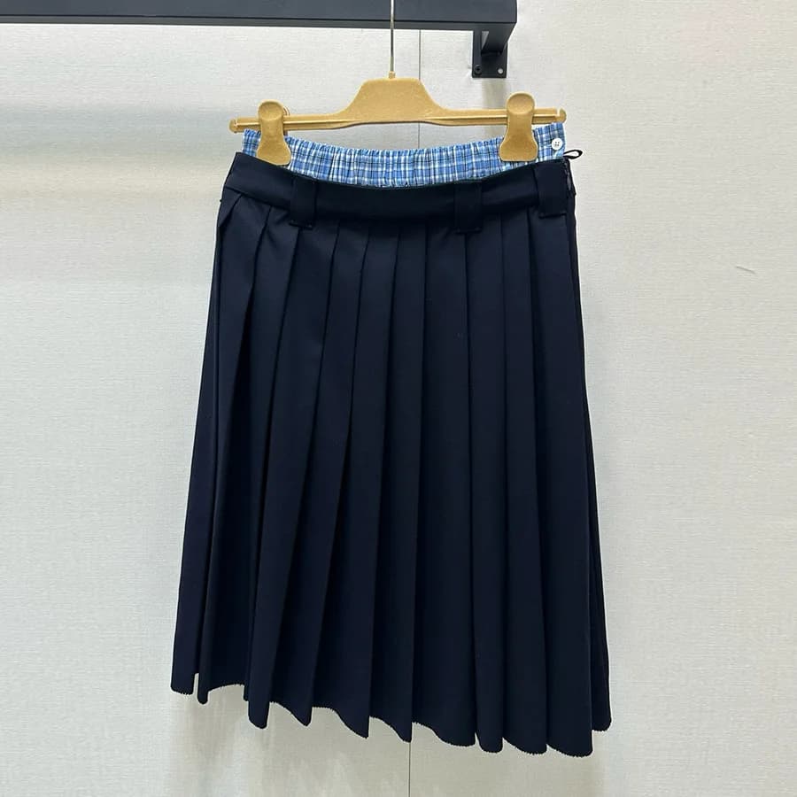 Mezza gonna da donna di media lunghezza in due pezzi finto patchwork blu con gonna a pieghe alla moda a vita bassa stile primaverile
