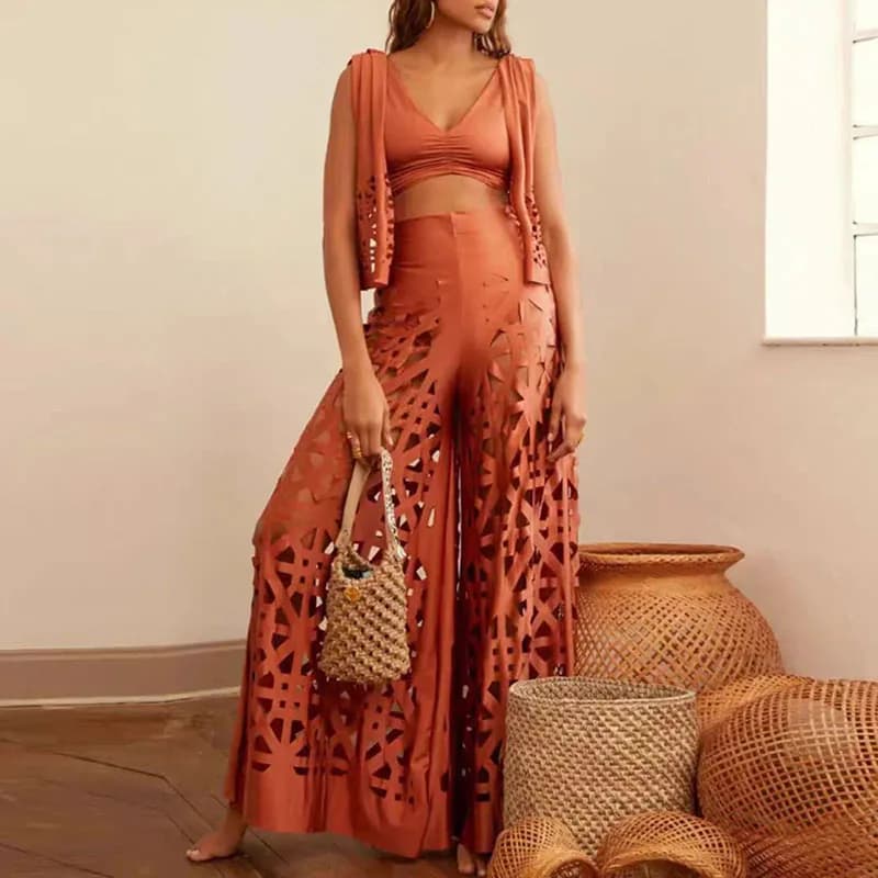 Women's three-piece swimsuit with short top and high waist pants, summer model 2026, with perforated details, solid color, for the beach