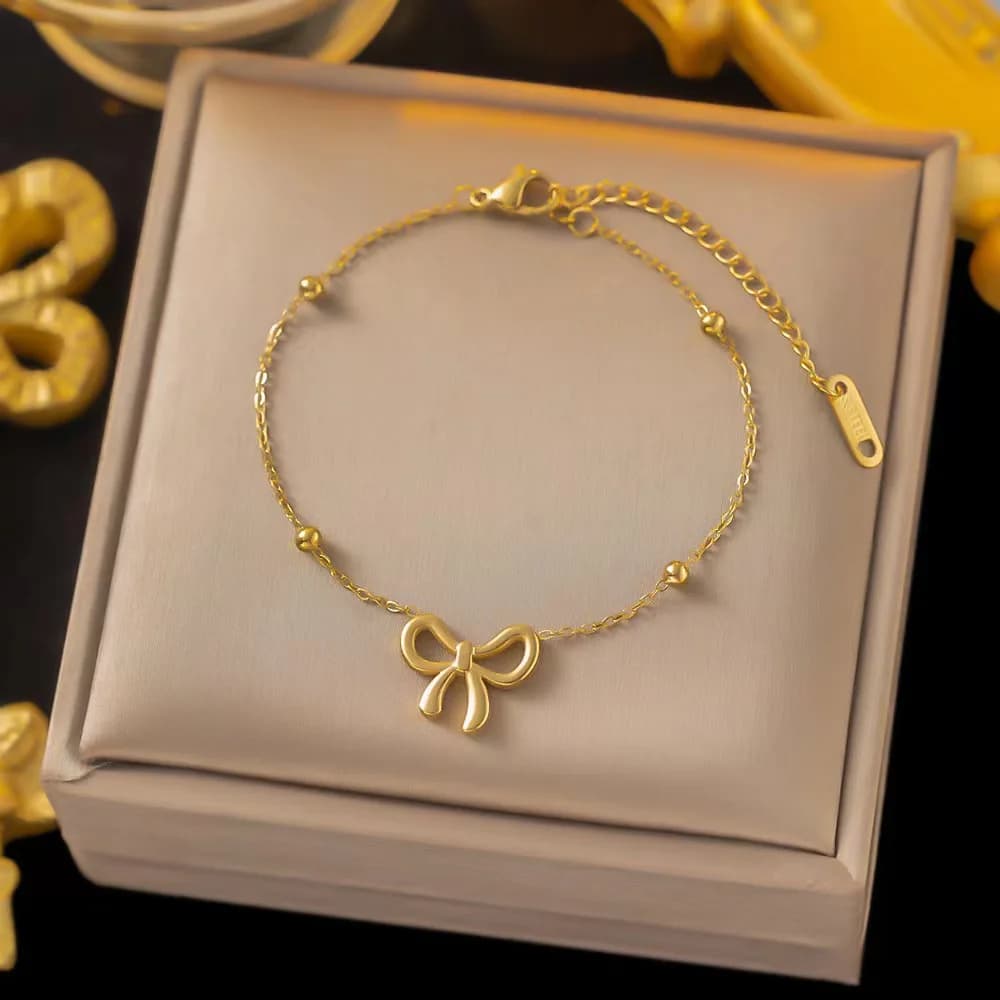 Set di Gioielli Trendy Classico in Acciaio Inossidabile con Ciondolo a Fiocco per Donne e Ragazze - Collana Bracciali Orecchini Girocollo Regali per Feste