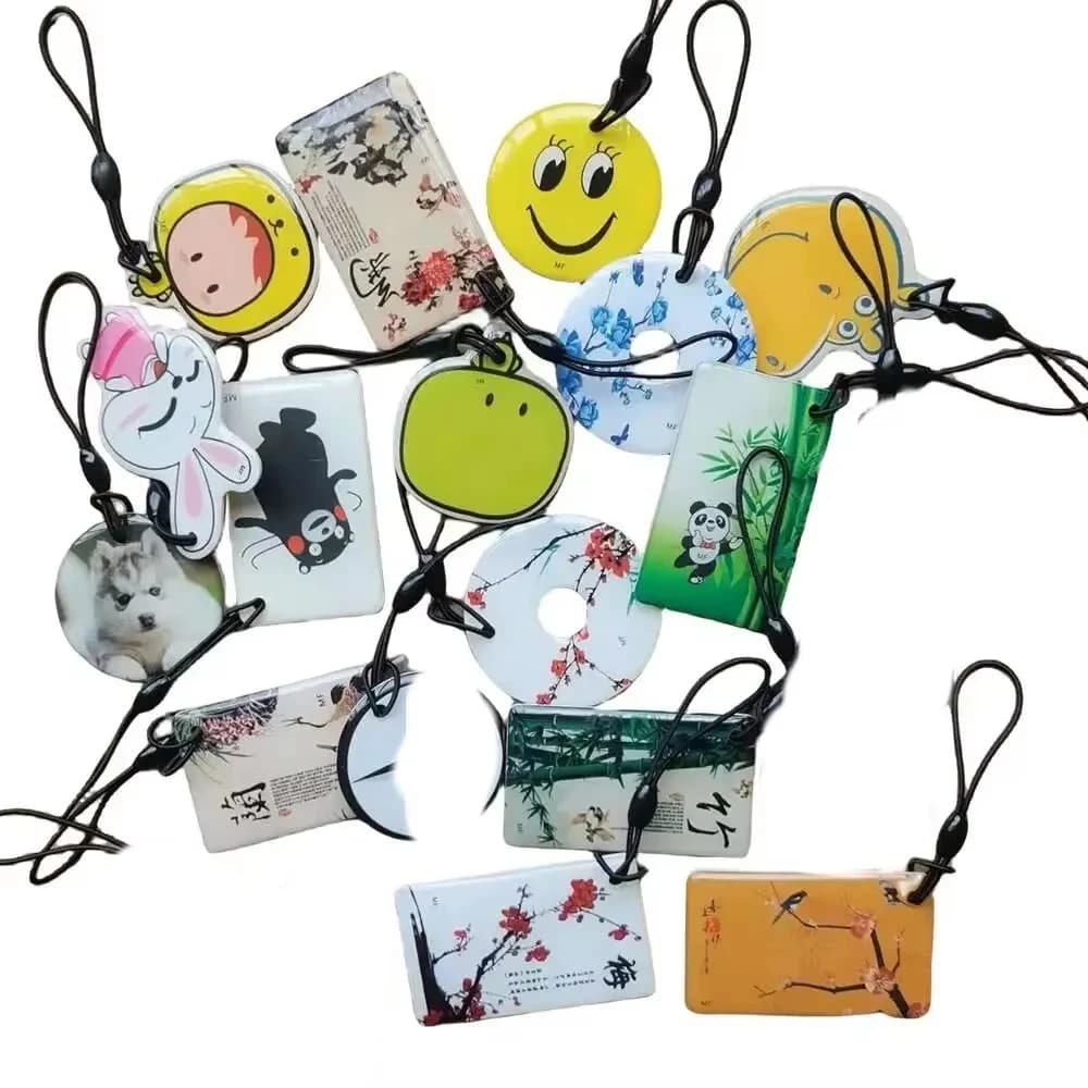 10/20/50/100 pz modello casuale 13.56Mhz UID IC variabile 1K S50 NFC RFID portachiavi riscrivibile accessori per il controllo degli accessi Tag della scheda