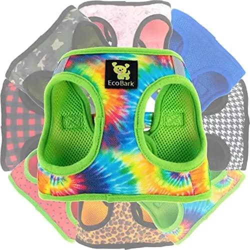 Imbracatura per cani in morbida rete con design riflettente, gilet regolabile e confortevole per animali domestici.