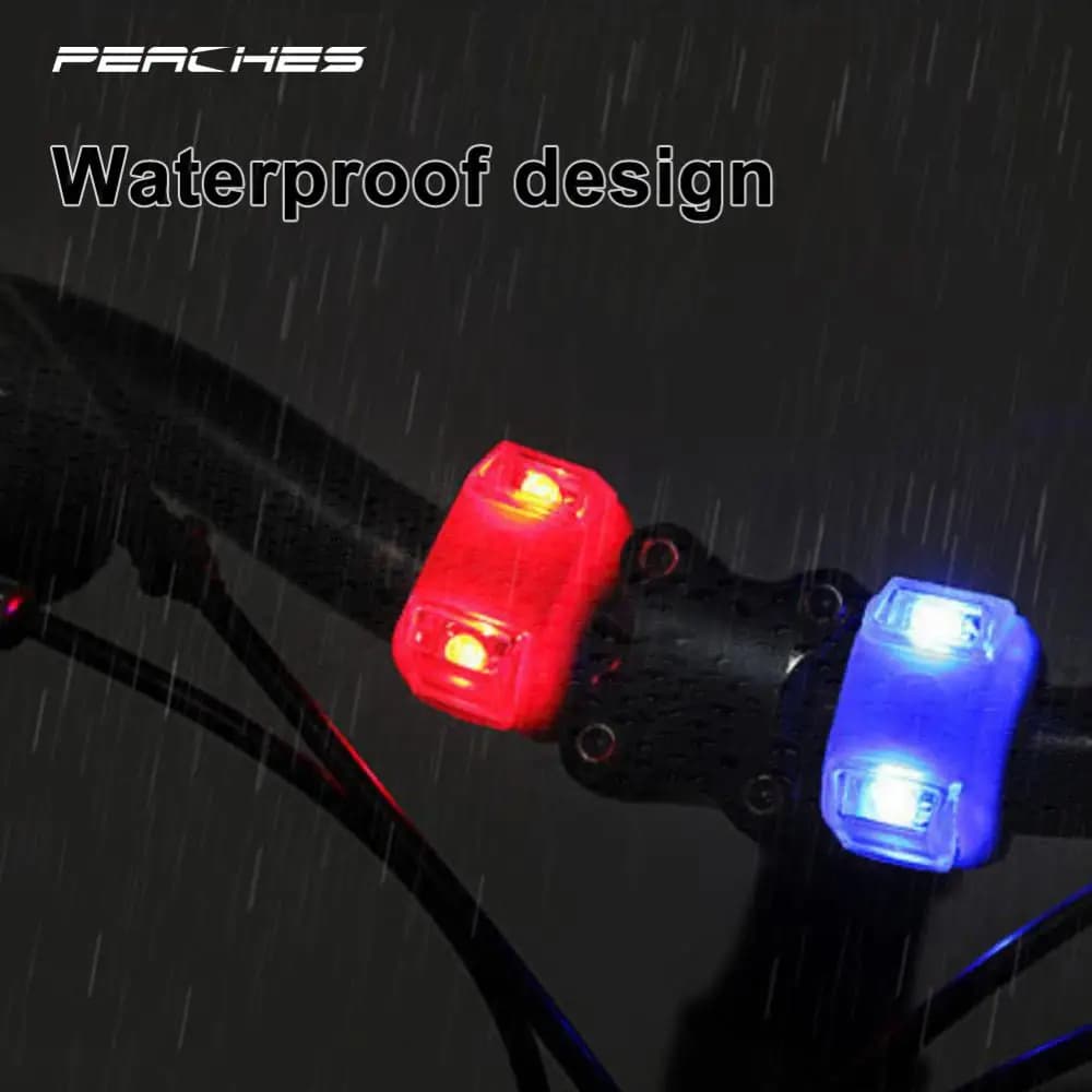 Luci flash a LED per bici Testa in silicone Ruota anteriore posteriore Lampada di sicurezza impermeabile Fanali posteriori verdi Accessori per ciclismo