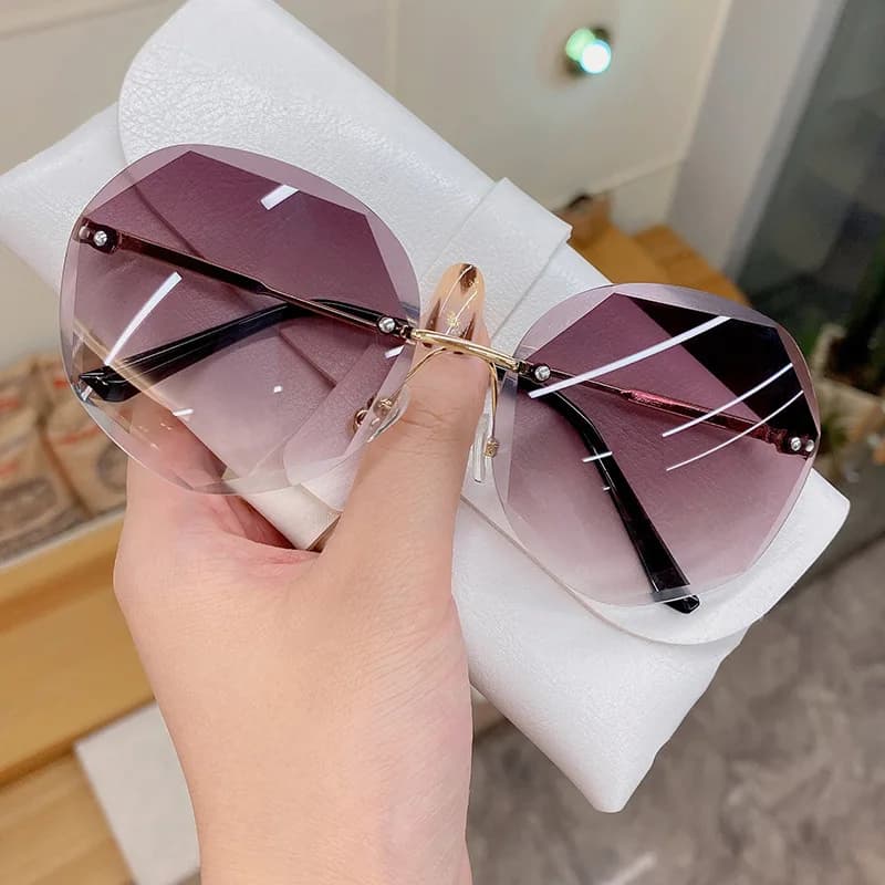 Popular anti-ultraviolet sunglasses fashionable frameless trimmed sunglasses Korean women's retro outdoor sunscreen glasses batch