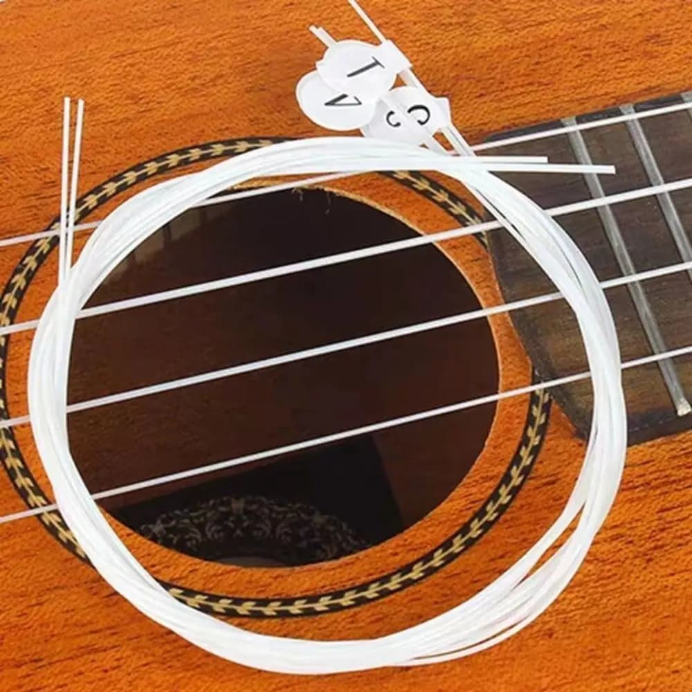 1 Set Corde per Ukulele in Nylon Corde per chitarra morbide di ricambio Corde per chitarra classica tono puro per Ukulele da 21 / 23 / 26 pollici