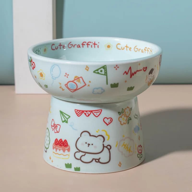 High‑Foot Elevated Ceramic Cat Bowl Cute Graffiti Anti‑Slip Base Pet Food Water Feeding Bowl for Kitten Small Dog