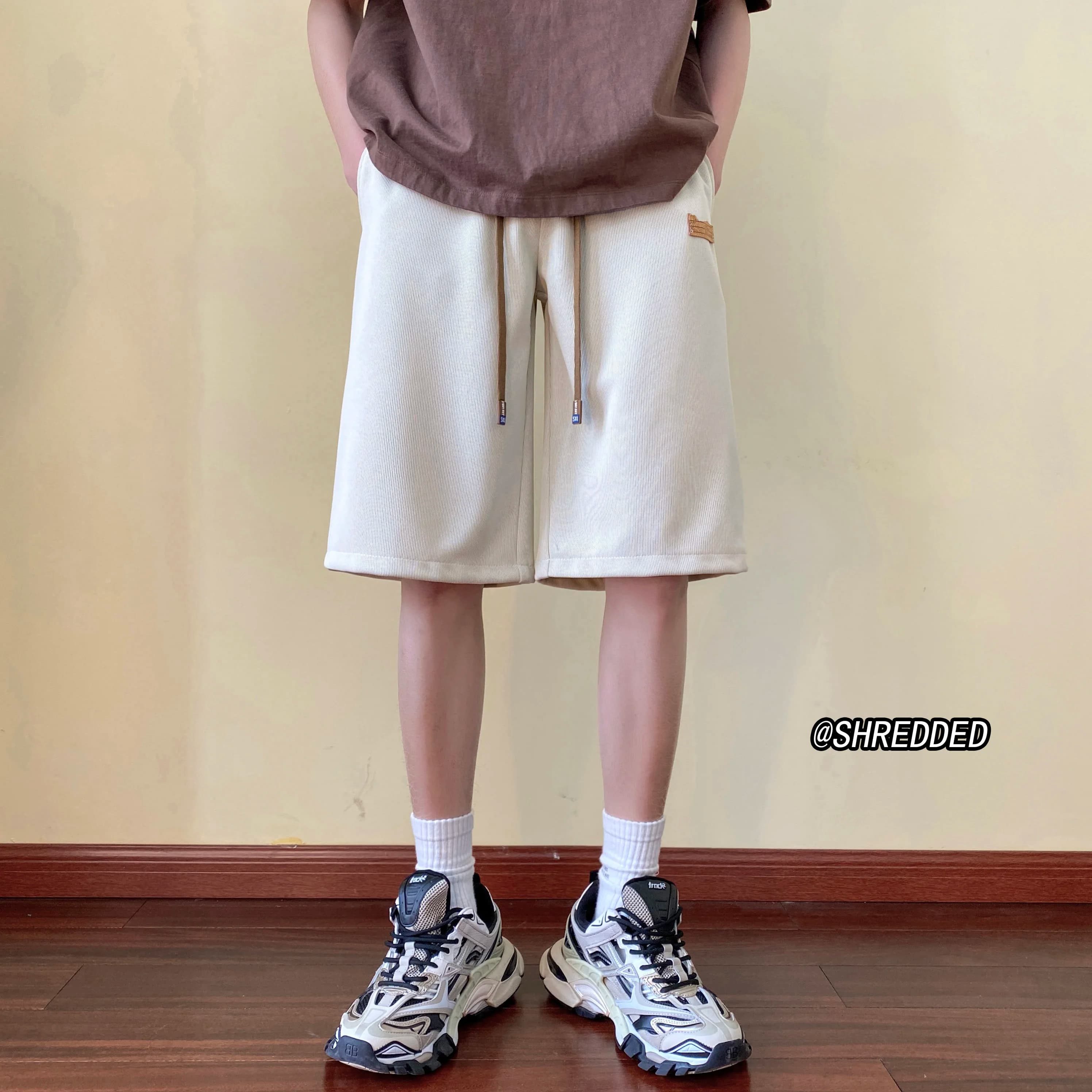 Pantaloncini da corsa neri da uomo, estivi, sottili, a cinque quarti, larghi, casual, a gamba dritta, stile giovanile alla moda, sensazione fresca