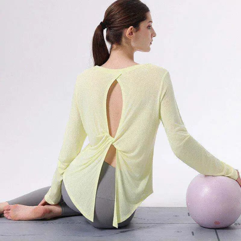 Abbigliamento sportivo a maniche lunghe da donna per corsa e fitness, top yoga ampio e traspirante con design traforato, abbigliamento sportivo snellente