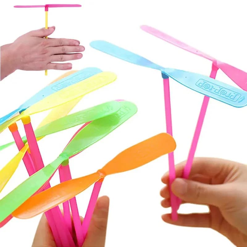 1-20 pezzi di plastica di bambù a forma di libellula spinta a mano elica volante gioco di sport all'aria aperta giocattolo per bambini regalo rotante giochi di frecce volanti