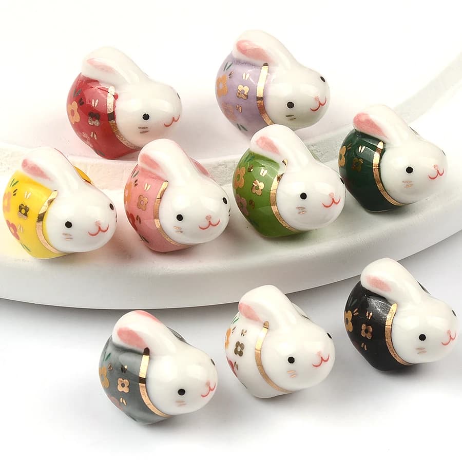 20x14mm Perline di ceramica di coniglio adorabili Animali del fumetto Perline di ceramica Ciondolo Perline di porcellana sciolte per la creazione di gioielli Accessori