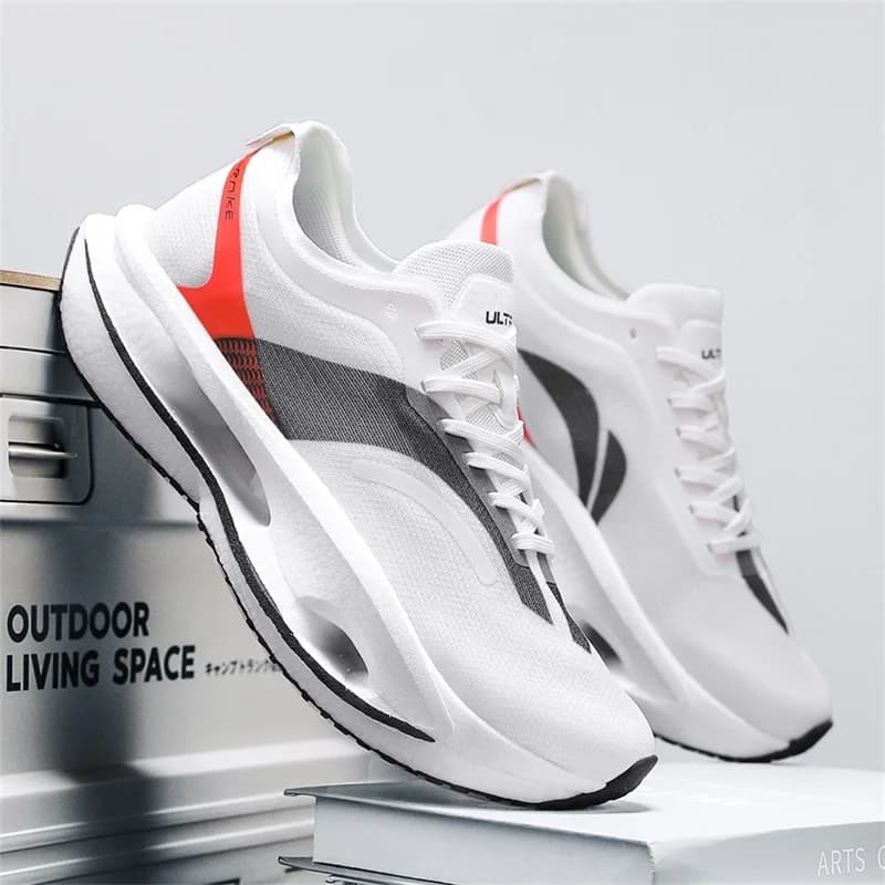 Scarpe da uomo Scarpe da corsa alla moda Casual Superficie in mesh traspirante Piastra in carbonio Suola in gomma Scarpe sportive limitate Rabbit rosso