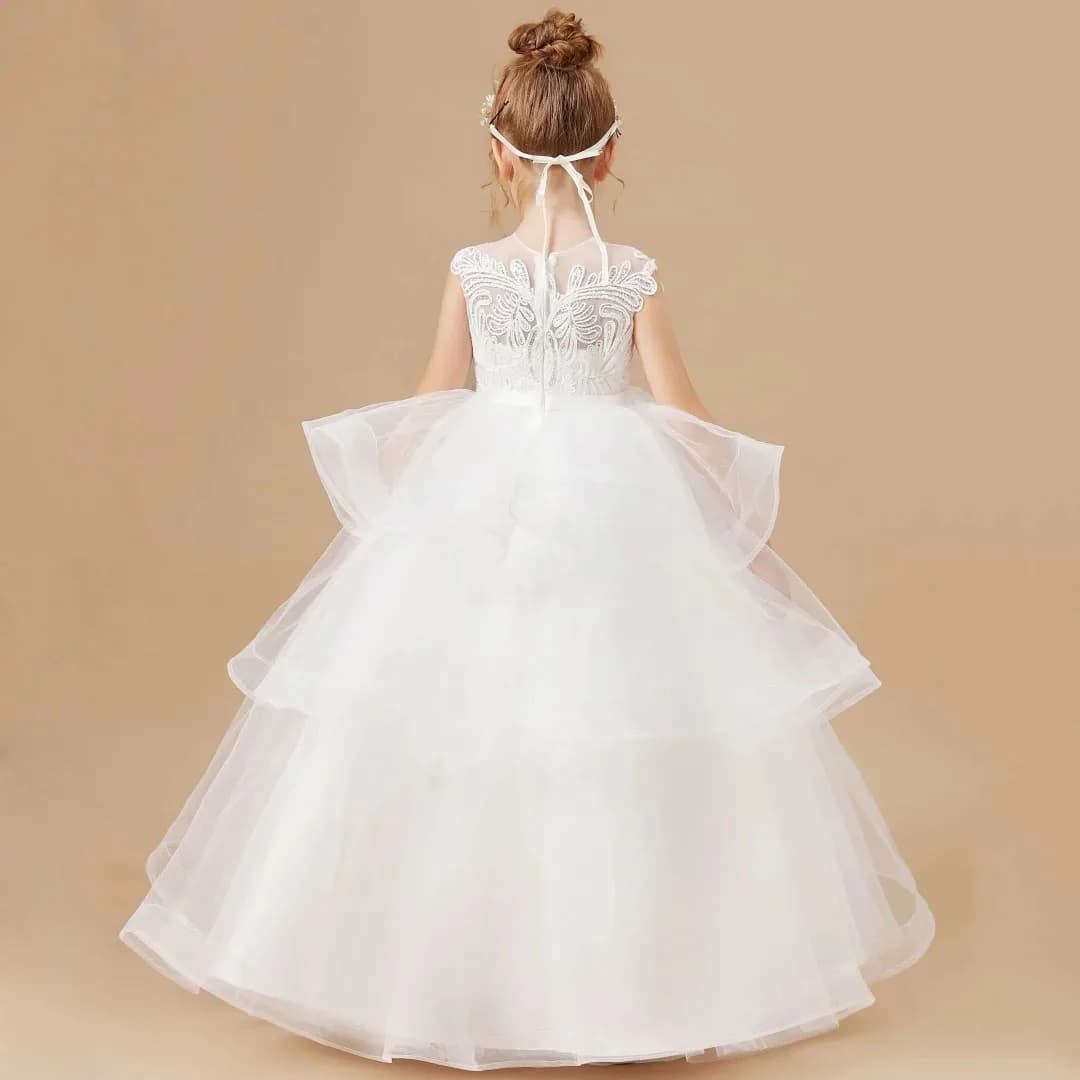 Abito da Damigella Personalizzato in Tulle Bianco con Applicazioni Floreali Multistrato Senza Maniche Adatto per Matrimoni e Comunioni