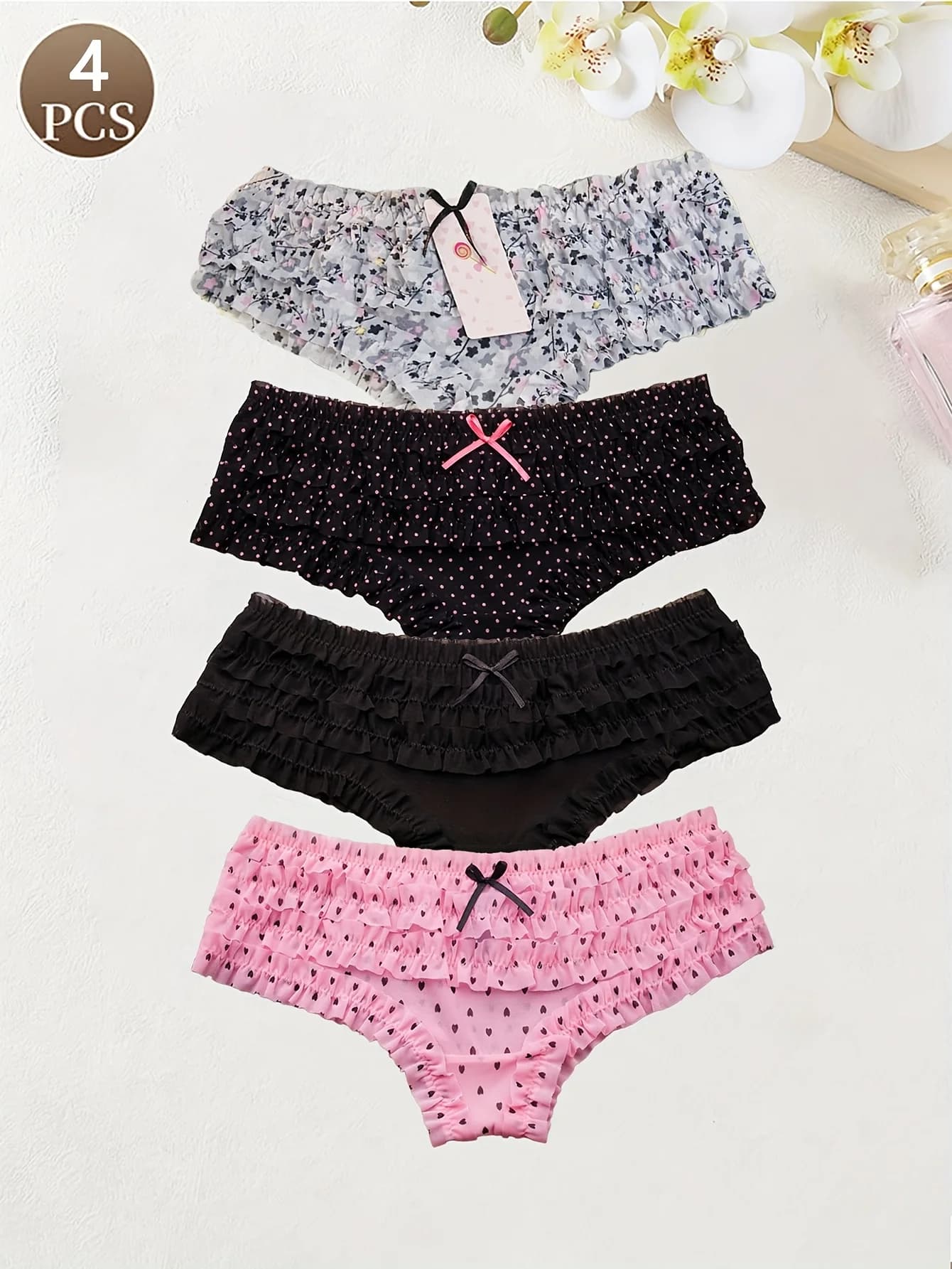 4 pezzi Tessuto dolce lavorato a maglia con piccoli motivi floreali a pois carini con cuciture in pizzo Slip a vita bassa da donna Senza cuciture traspirante fa