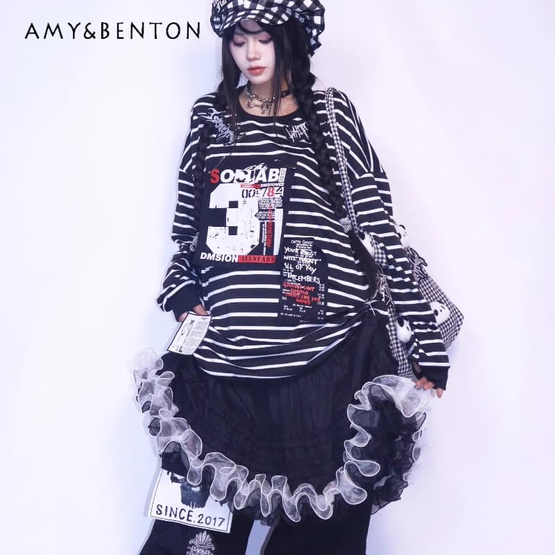 Felpa da donna dal design originale punk a righe scure autunno inverno nuova maglietta a maniche lunghe versatile in pile sottile allentato da donna