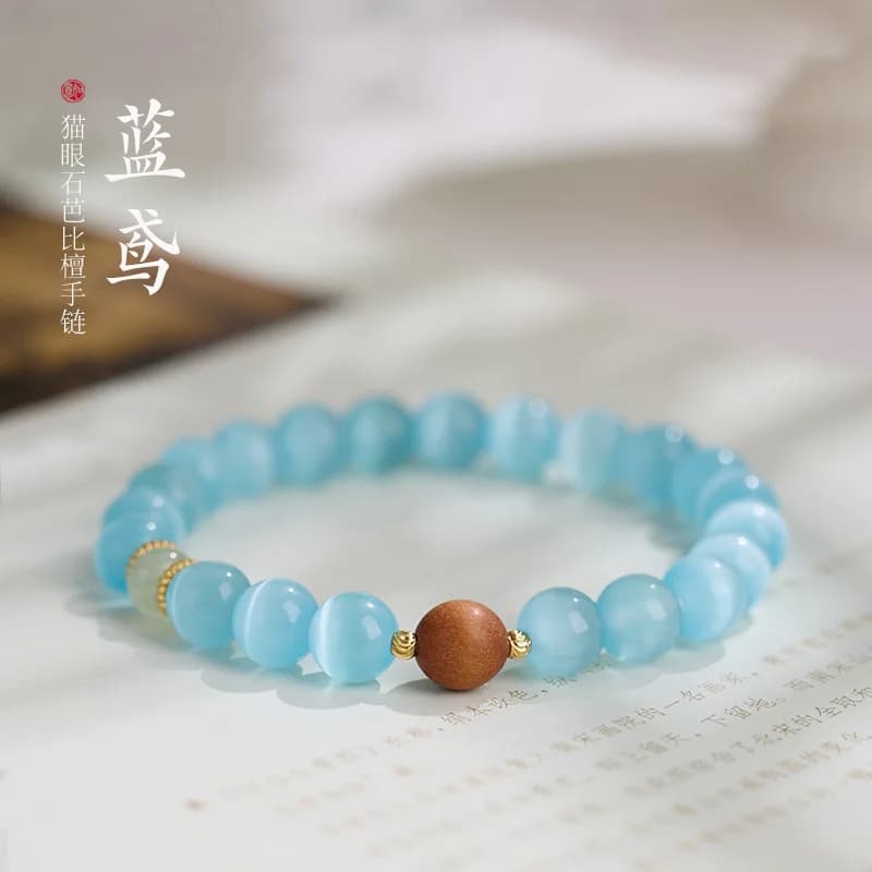 Bracciale di fascia alta in legno di sandalo Barbie con fragranza al latte in pietra blu occhio di gatto ghiacciaio stile tempio
