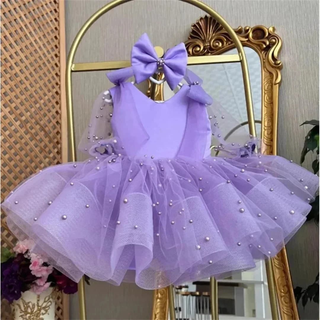 Bellissimo abito da ragazza di fiori personalizzato a maniche lunghe con fiocco che borda gonne da principessa in tulle abito da spettacolo abito da prima comunione