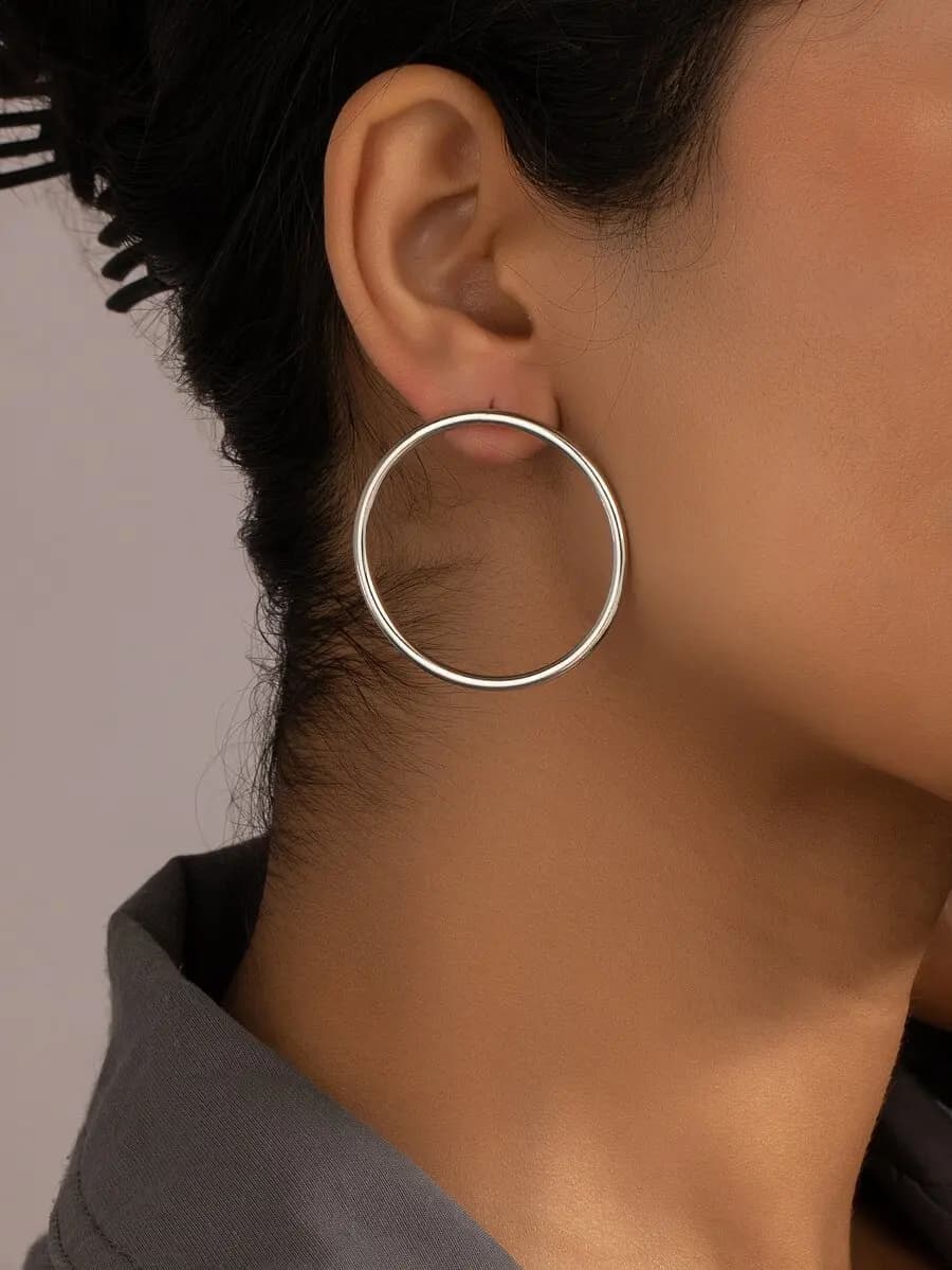 Circle-shaped stud earrings for everyday wear — lightweight, minimalist design with secure butterfly backing