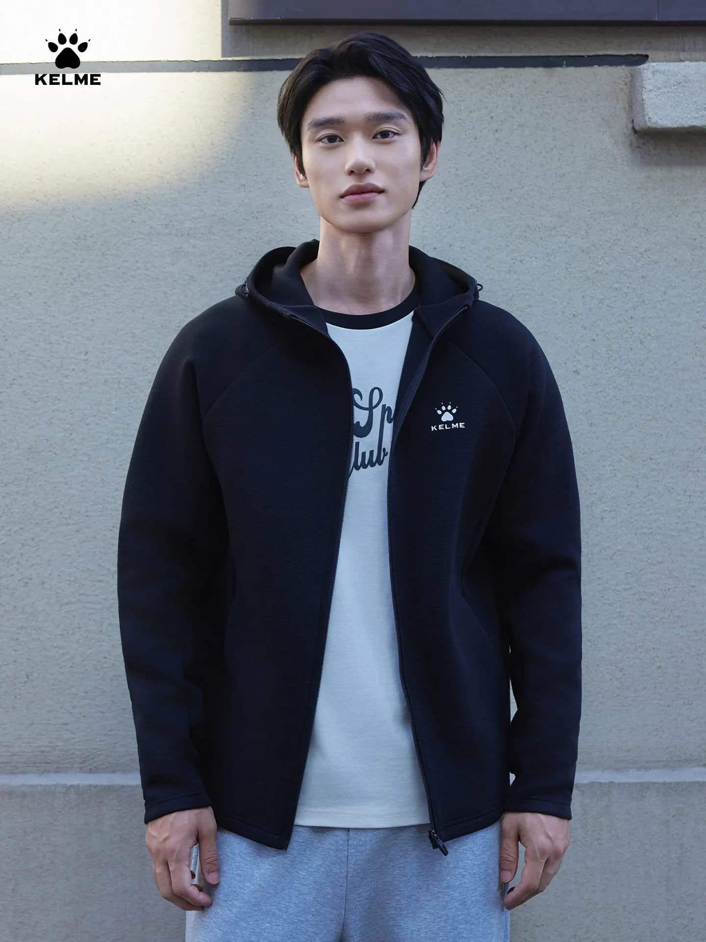 Kelme Giacca casual lavorata a maglia Sport all'aria aperta Top con cappuccio Corsa Fitness Cardigan antivento Felpa con cappuccio alla moda quotidiana