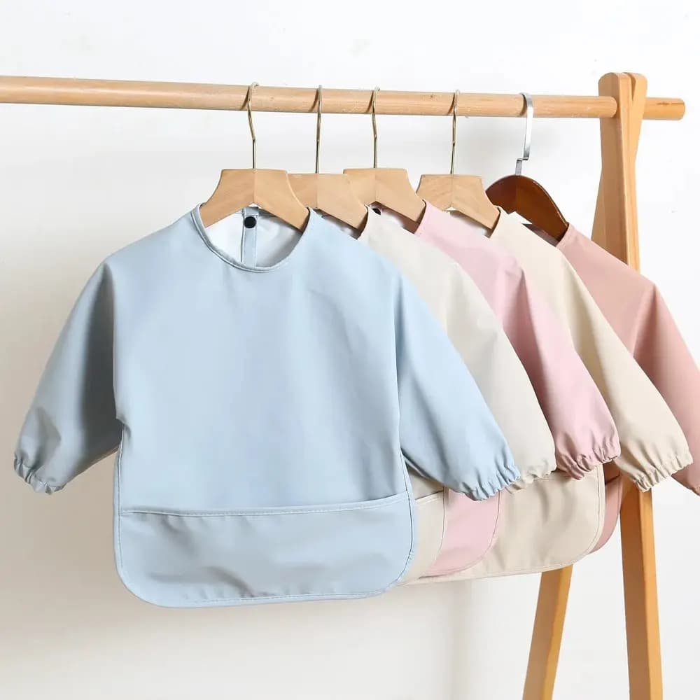 Babies for feeding the baby in solid color with long sleeves Aprons for babies and girls Waterproof artistic aprons for children easy to clean