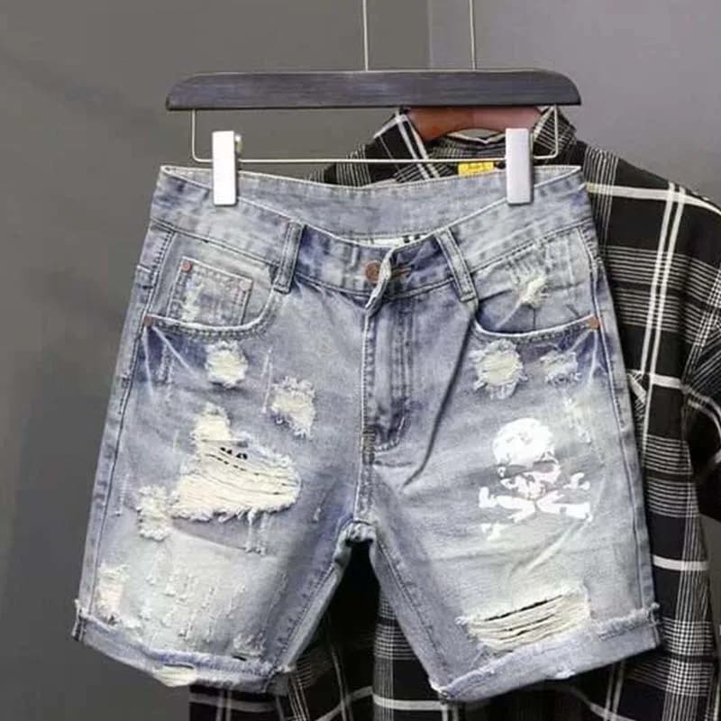 Jeans corti strappati elasticizzati da mendicante con foro per perline indossati da uomo estivi Pantaloncini di jeans slim fit alla moda coreana