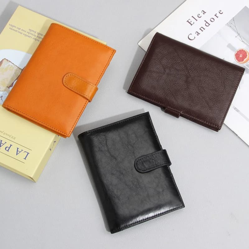 Genuine Leather Travel Passport Wallet RFID Blocking Multi‑Slot Credit ID Card Organizer Wallet Retro Snap Button Passport Cover