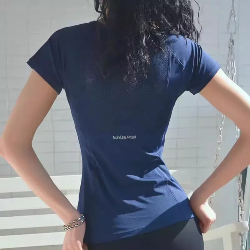 T-shirt sportiva da donna allentata primaverile ed estiva a maniche corte ad asciugatura rapida da corsa Yoga Fitness T-shirt con collo traspirante in rete