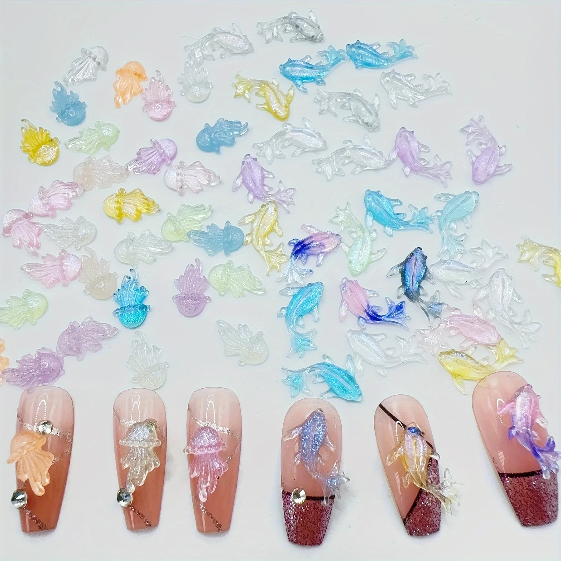 Set di ciondoli per animali oceanici in miniatura da 100 pezzi per nail art Simpatico pesce in resina Kawaii con retro piatto strass Decorazioni per unghie fai da te