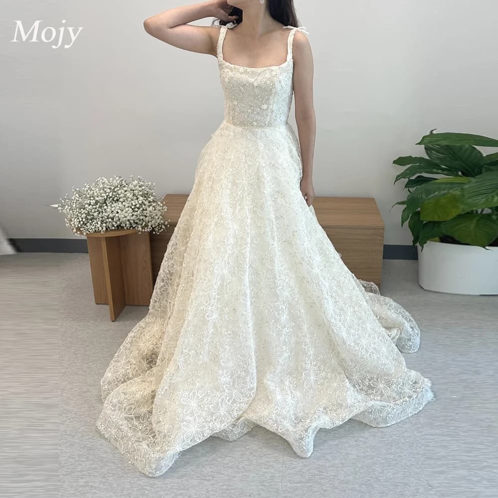 Mojy Squisito Perline di pizzo Una linea Abiti da sposa coreani per il servizio fotografico Cinghie Collo quadrato Lunghezza pavimento Corsetto Indietro Abiti da sposa
