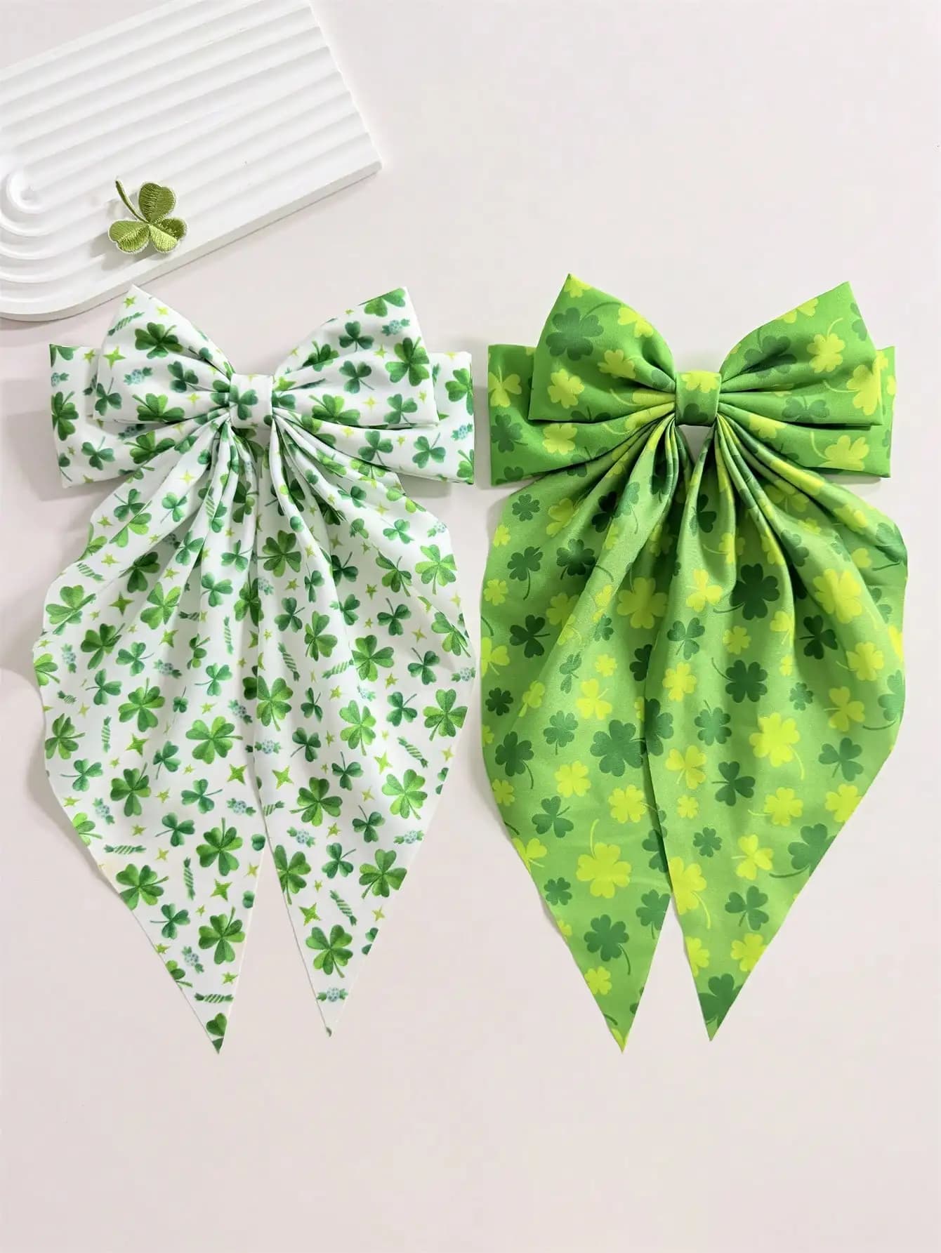 2 hair clips with long tail bow with green and white clover print for women and children
