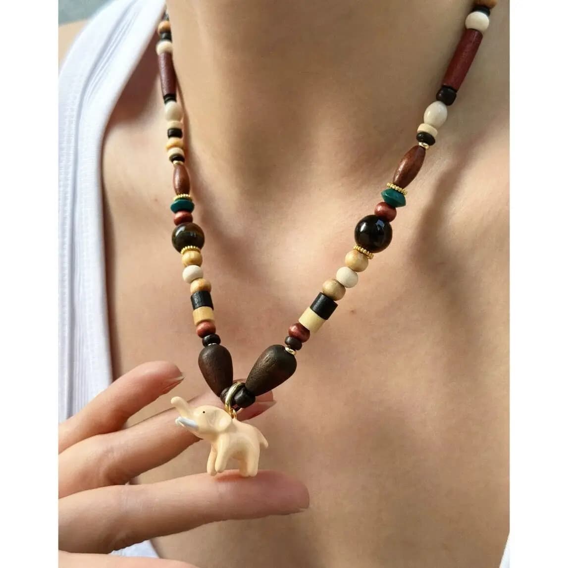 Necklace with pearls in wood and stone tiger eye faded, with stereoscopic elephant orange and pink, for woman