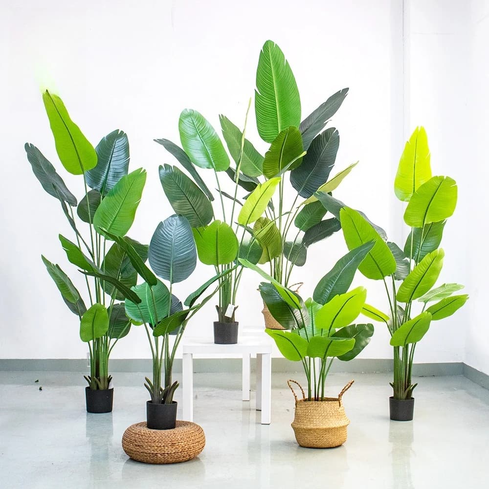 Traveler of artificial trees banana plant in paradise bird pot large leaves, hotel office garden decoration