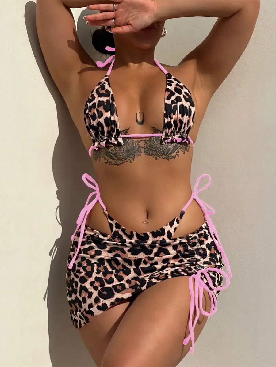 Costume da bagno due pezzi reversibile con stampa leopardata e dettagli con laccetti rosa per l'abbigliamento estivo da spiaggia