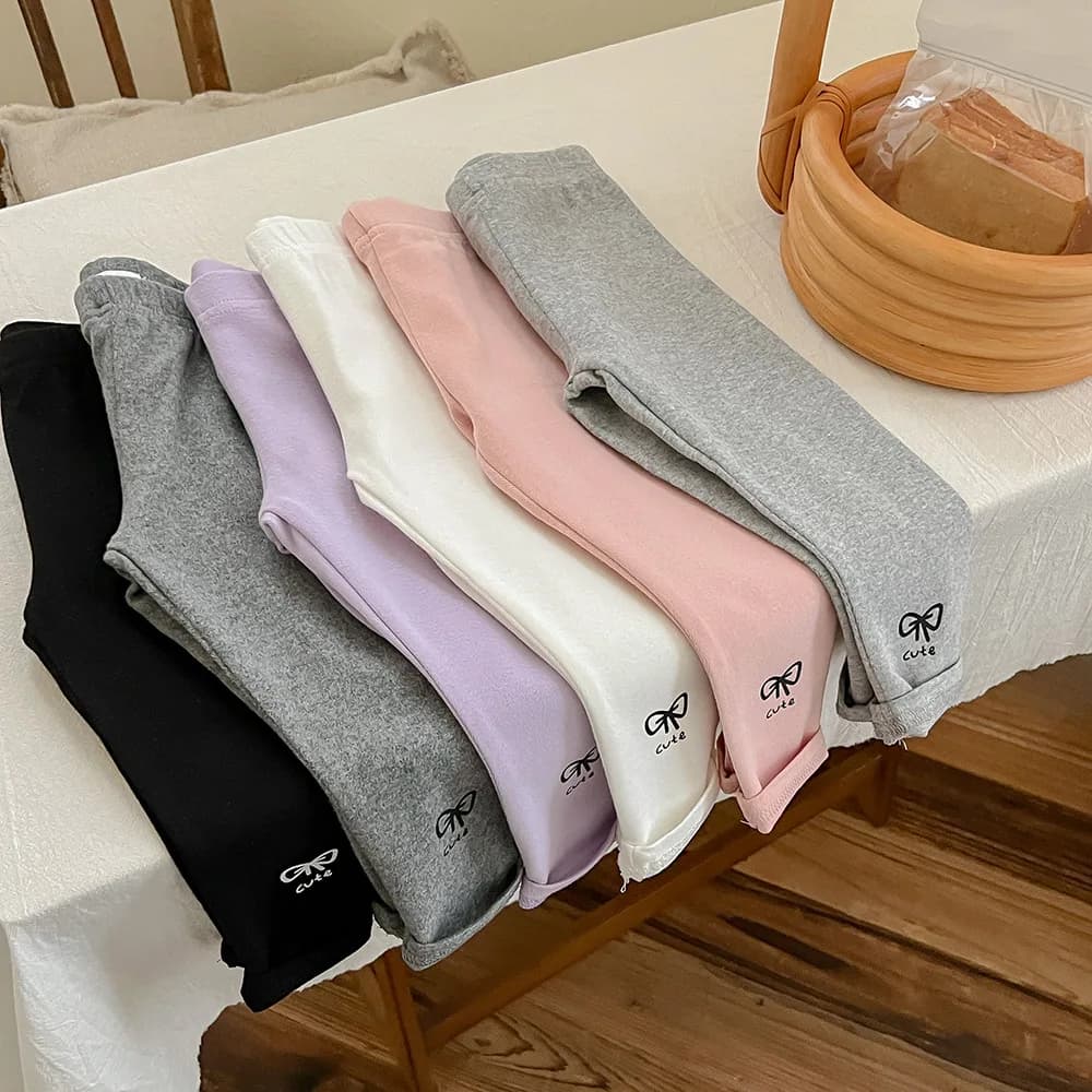 Nuovi leggings per bambini autunno primavera 1-8 anni pantaloni skinny stile ragazza tinta unita con fiocco carino pantaloni capispalla per bambini