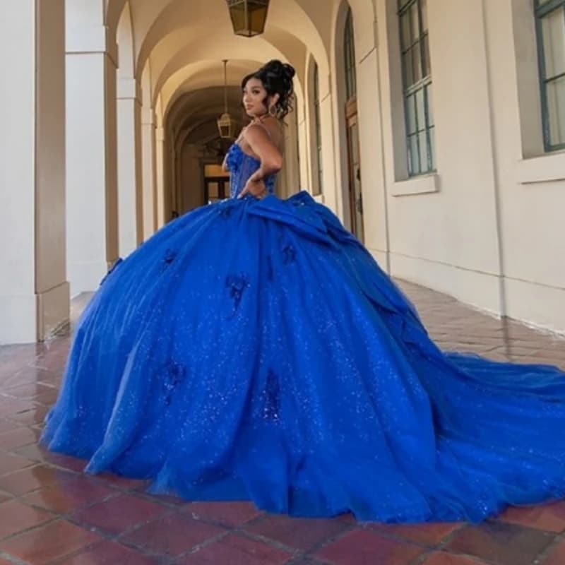 Royal Blue Shiny Princess Spaghetti Strap Sweet 16 Dress Abiti Quinceanera Applique Perline di pizzo Corsetto Fiocco Tull Festa di compleanno