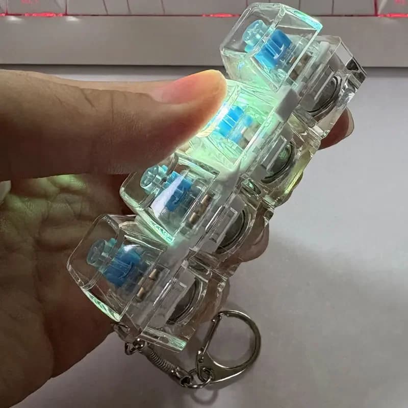 1PC Tastiera Meccanica Giocattolo Luminosa, Clicker Tastiera Sonoro Antistress, Portachiavi 4-in-1 con Tasti a Forma di Gatto, per Adulti per Alleviare lo Stress