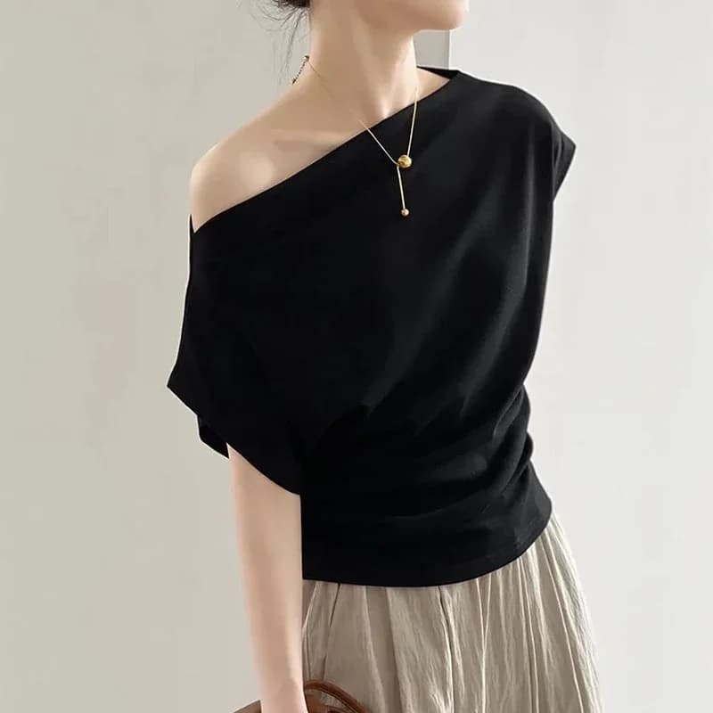 Maglietta francese Sexy con spalle scoperte donna estate moda colletto Slash asimmetrico nero Tees coreano Chic pieghettato Casual femminile Top