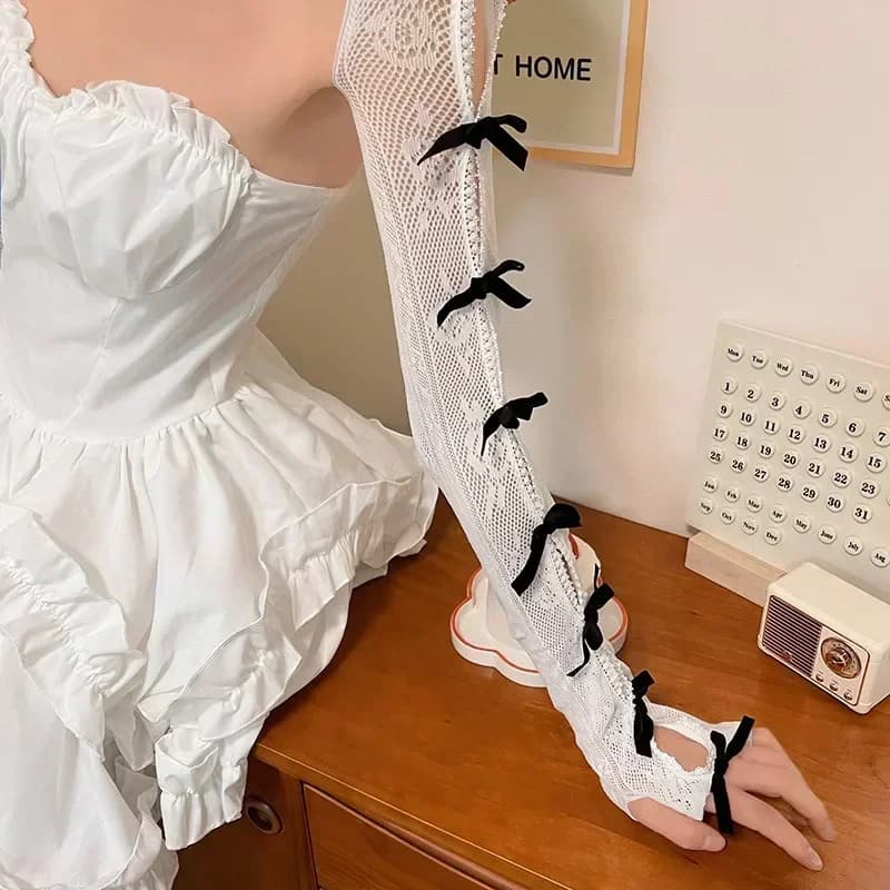 Carino monopezzo in pizzo con maniche a fiocco scialle scaldamuscoli Lolita Sweet Jk Mesh Flock Oversleeve protezione solare guanti lunghi senza dita da donna