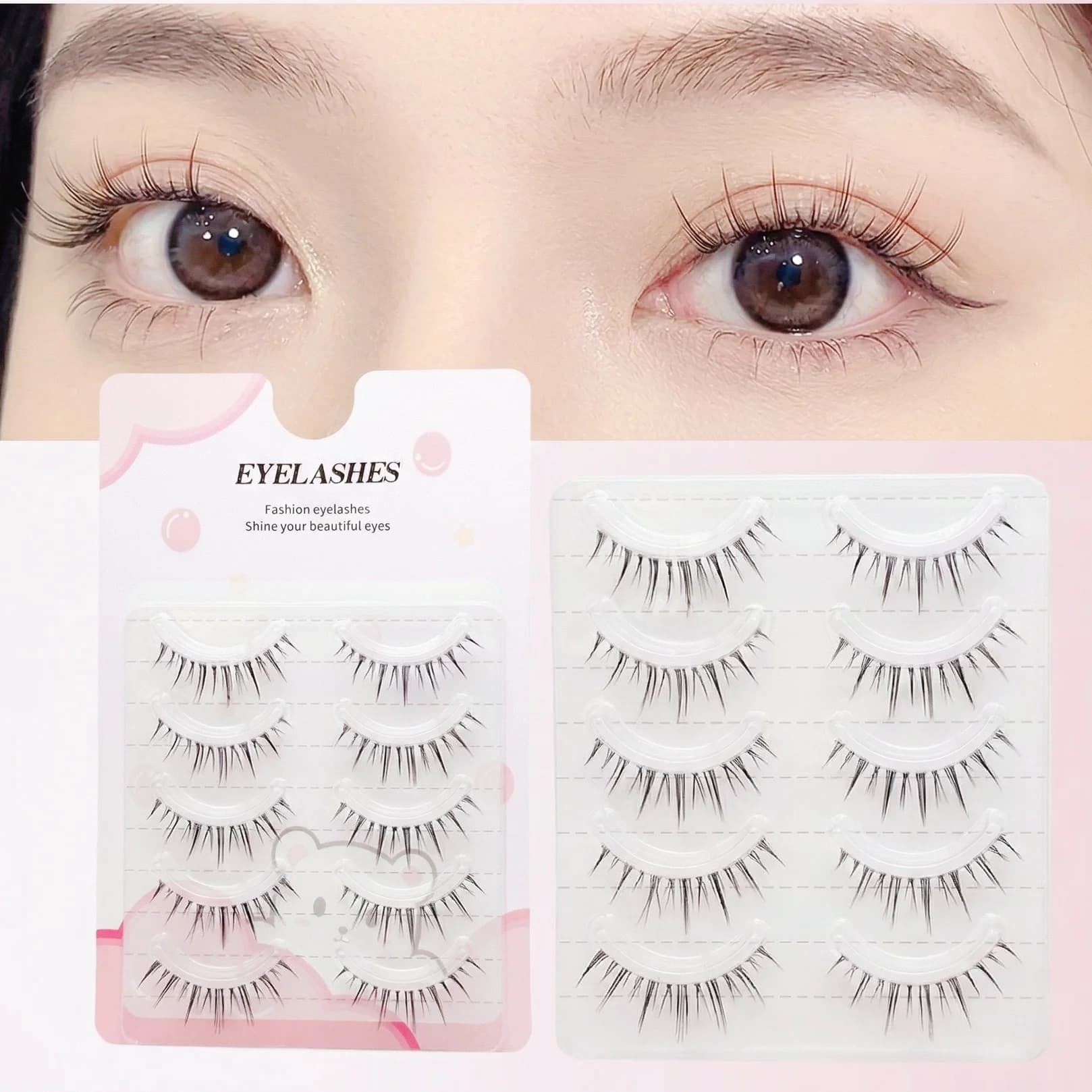 A box of five pairs of fake manga style eyelashes with transparent base, designed for a natural and realistic look